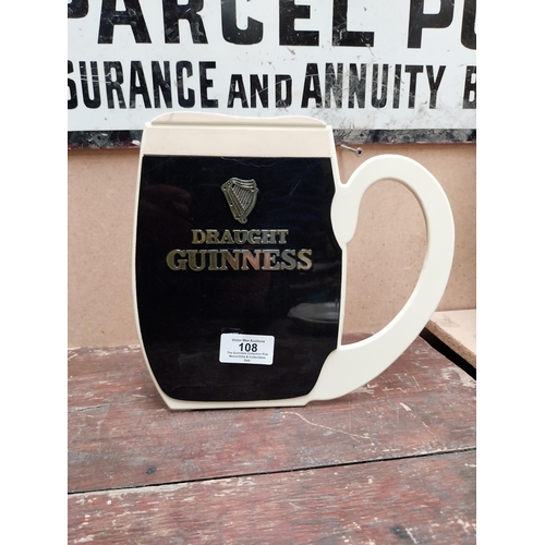 108 - Draught Guinness Plastic Tankard shelf sign. {21 cm H x 23 cm W}