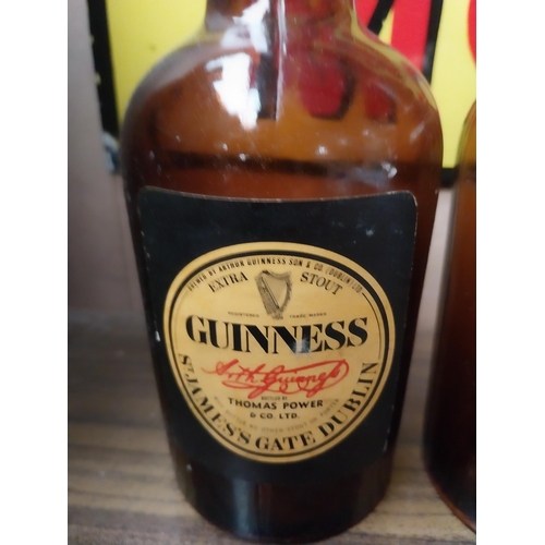 1080 - Three pint Guinness Bottles - O 'Dwyer Bros Pearse Street and Thomas Carr and Co. {21 cm H x 8 cm Di... 