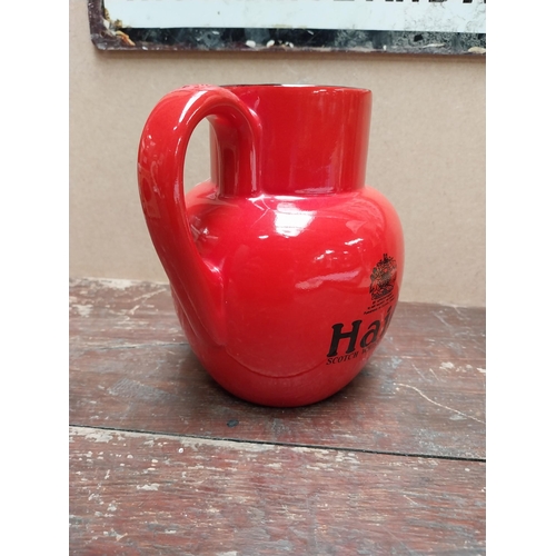 109 - Haig Scotch Whiskey Carltonware ceramic water jug. {16 cm H x 15 cm W x 11 cm D}.