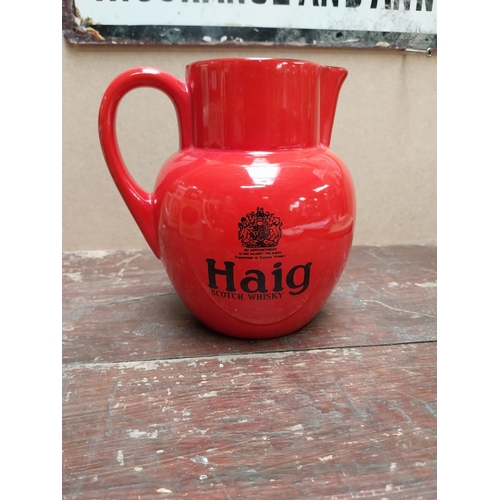 109 - Haig Scotch Whiskey Carltonware ceramic water jug. {16 cm H x 15 cm W x 11 cm D}.