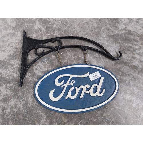 1107 - Ford cast iron double sided wall plaque with bracket. {30 cm H x 36 cm W].