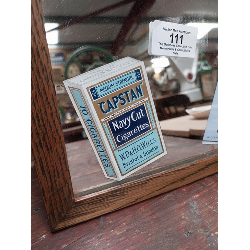 111 - Wills's Capstan advertising Mirror {28 cm H x 23 cm W}.