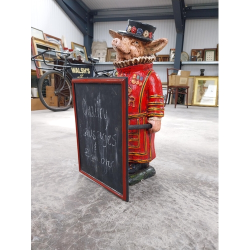 1114 - Composition Beefeater Pig menu holder. {59 cm H x 28 cm W x 24 cm D}