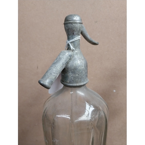 1119 - Two soda siphons - Mineral Waters Distillers Dublin. {32 cm H x 9 cm Dia.}.