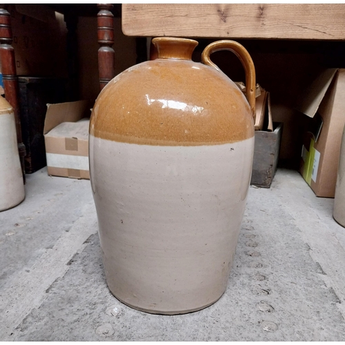 113 - 19th. C. stone ware whiskey flagon  - M. Mulvaney Hardware Wine and Spirit Merchant Mullagh Co Cavan... 