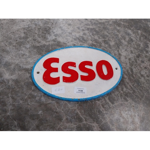 1139 - Cast iron Esso plaque. {30 cm H x 20 cm W}.