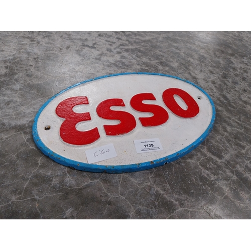 1139 - Cast iron Esso plaque. {30 cm H x 20 cm W}.