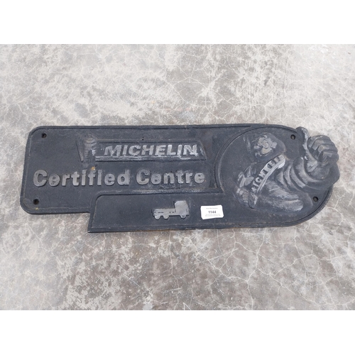 1144 - Cast Iron Michelin advertising plaque. {20 cm H x 58 cm W}.