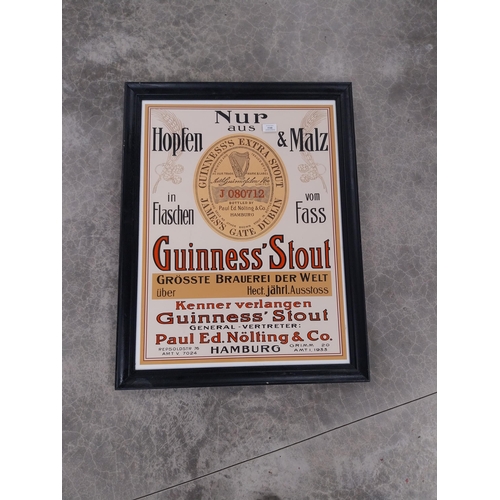 1149 - Paul Ed Nolting Hamburg Guinness advertising print in wooden frame. {81 cm H x 63 cm W}.