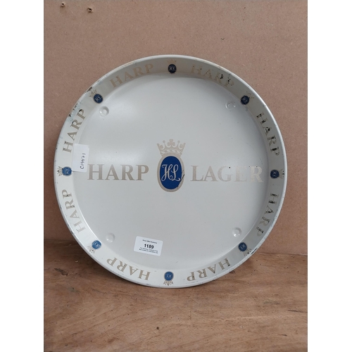 1189 - Harp Lager tinplate drinks tray, {3 cm H x 30 cm Dia.}  Harp Lager ashtray {3 cm H x 20 cm Dia} and ... 