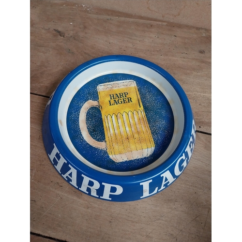 1189 - Harp Lager tinplate drinks tray, {3 cm H x 30 cm Dia.}  Harp Lager ashtray {3 cm H x 20 cm Dia} and ... 