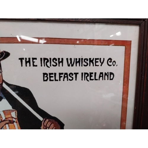 125 - The Irish Whiskey Co Belfast Ireland framed advertising print {60 cm H x 49 cm W}.