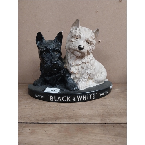 1263 - Black and White Scotch Whiskey Ruberoid advertising dogs. {19 cm H x 25 cm W x 8 cm D}.