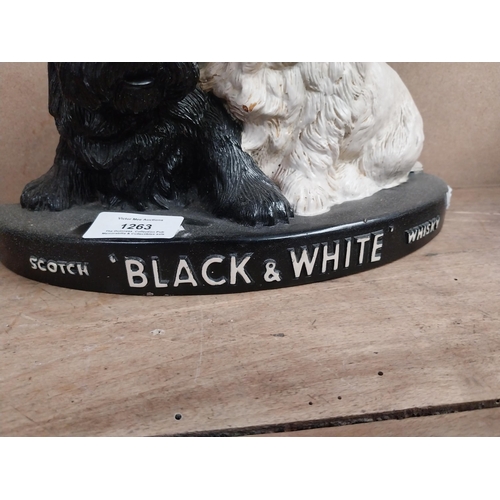 1263 - Black and White Scotch Whiskey Ruberoid advertising dogs. {19 cm H x 25 cm W x 8 cm D}.