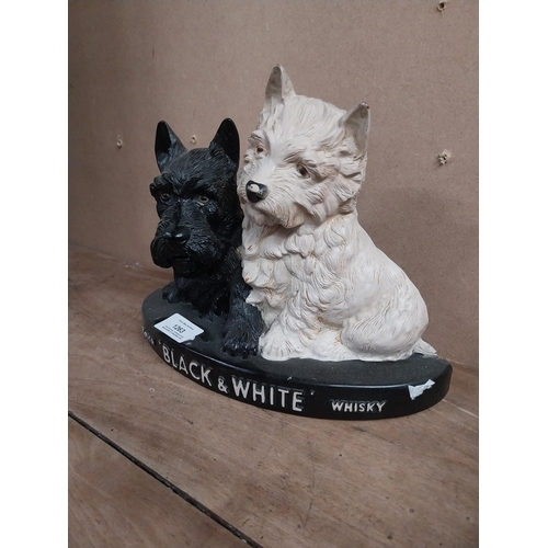 1263 - Black and White Scotch Whiskey Ruberoid advertising dogs. {19 cm H x 25 cm W x 8 cm D}.