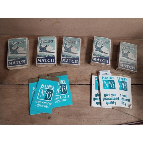 1266 - Five boxes of Swift Matches {11 cm H x 6 cm W x 2 cm D} and Six Player's No 6 notebooks {7 cm H}.