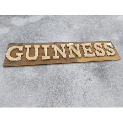 1274 - Guinness wooden advertising board. {24 cm H x 99 cm W}.