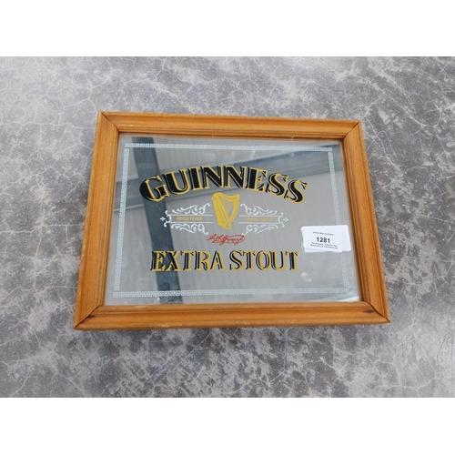 1281 - Guinness Extra Stout framed advertising mirror {21 cm H x 27 cm W}.