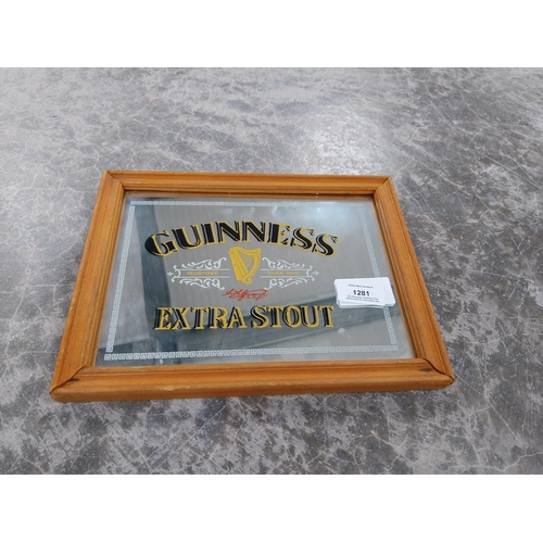 1281 - Guinness Extra Stout framed advertising mirror {21 cm H x 27 cm W}.