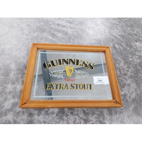 1281 - Guinness Extra Stout framed advertising mirror {21 cm H x 27 cm W}.