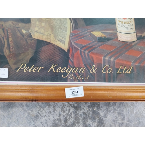 1284 - Peter Keegan and Co Ltd Belfast Finest No 1 Whiskey framed print. {62 cm H x 48 cm W}.