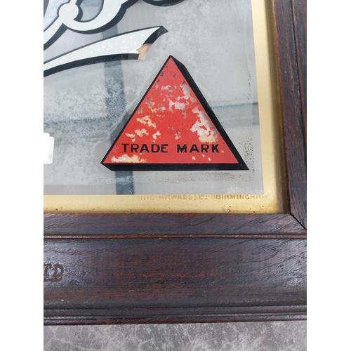 1285 - Bass Great Stuff mirror in original stamped frame. {46 cm H x 56 cm W}.