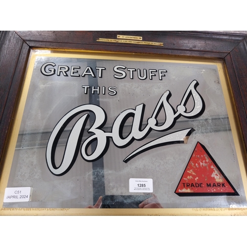 1285 - Bass Great Stuff mirror in original stamped frame. {46 cm H x 56 cm W}.