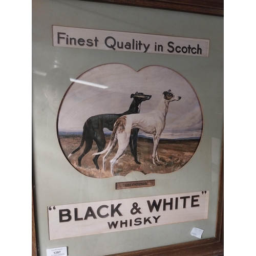 1287 - Black and White Scotch Whiskey framed advertising print. {59 cm H x 50 cm W}.