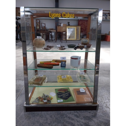 1304 - 1950's Lyon's Cakes chrome and glass counter display cabinet. {70 cm H x 53 cm W x 33 cm D}.