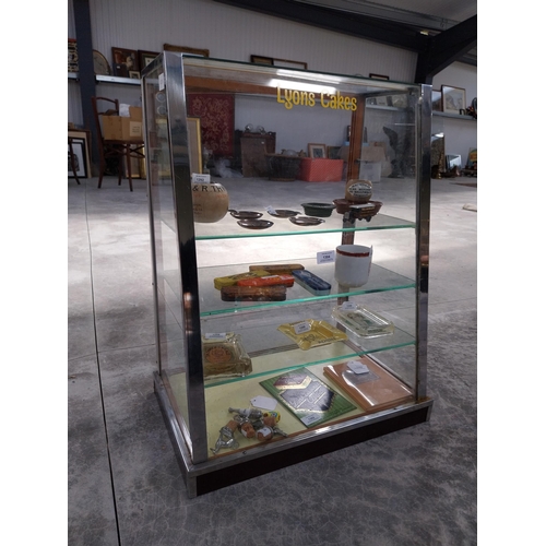 1304 - 1950's Lyon's Cakes chrome and glass counter display cabinet. {70 cm H x 53 cm W x 33 cm D}.