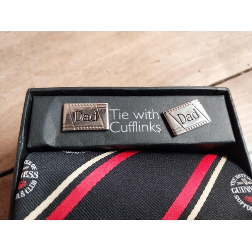 1306 - Guinness Cuff links set and Guinness Tie in presentation box. {6 cm H x 10 cm W x 10 cm D}