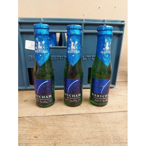 1311 - Two dozen unopened Babycham bottles in original advertising crate. {19 cm H x 22 cm W x 21 cm D].