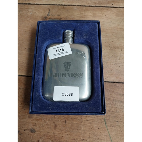 1315 - Guinness hip flask in original box. PART OF THE DAVID HUGHES COLLECTION.