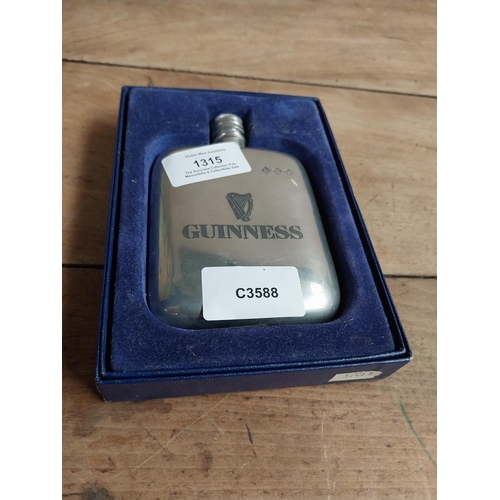 1315 - Guinness hip flask in original box. PART OF THE DAVID HUGHES COLLECTION.