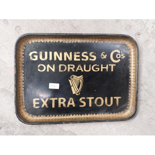 1316 - Guiness Draught Extra Stout tinplate advertising drinks tray. {37 cm H x 34 cm W}.