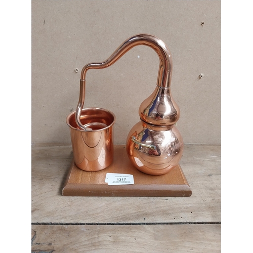 1317 - Copper Model of Still on wooden plinth. {22 cm H x 19 cm W x 12 cm D}.