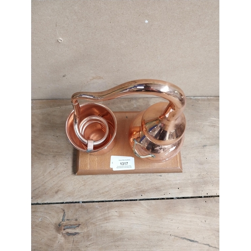 1317 - Copper Model of Still on wooden plinth. {22 cm H x 19 cm W x 12 cm D}.