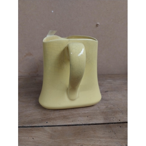 1318 - Robin Cigarettes ceramic water jug. {12 cm H x 13 cm W x 11 cm D}.