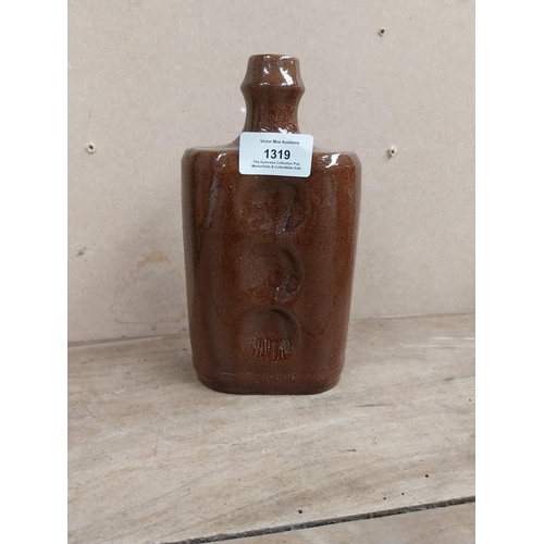 1319 - Early 20th C. Stoneware bottle. {20 cm H x 11 cm W x 6 cm D}.