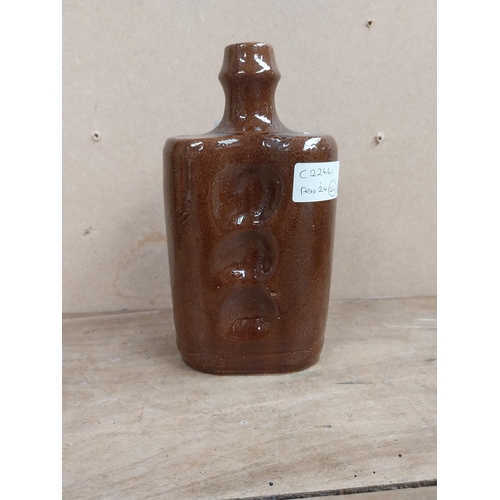 1319 - Early 20th C. Stoneware bottle. {20 cm H x 11 cm W x 6 cm D}.