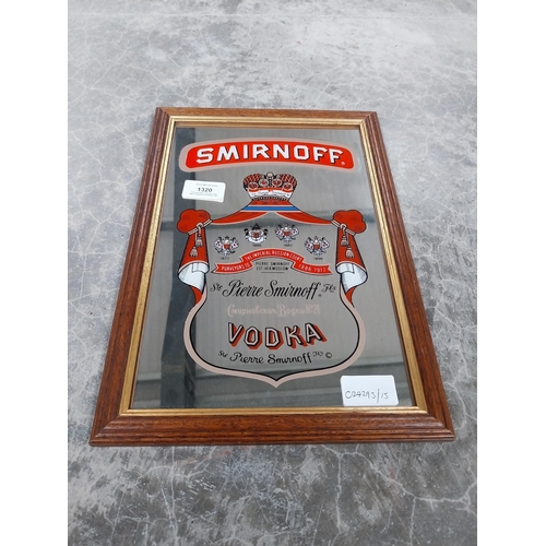 1320 - Smirnoff Vodka framed advertising mirror. {34 cm H x 24 cm W}.