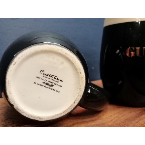 1321 - Pair of Carlton Ware Guinness advertising tankards  {H 10cm x W 11cm x D 8cm }. - NOT AVAILABLE TO V... 