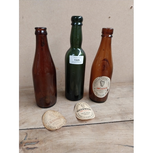 1325 - Three Guinness bottles - Hennessy Ferbane, James McDaid Ramelton, Jacob Limited New Ross. {23 cm H x... 