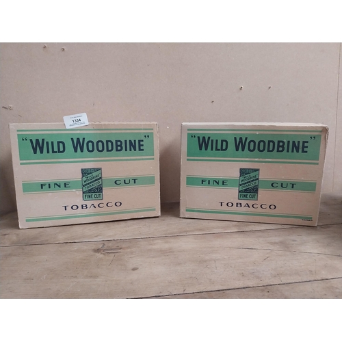 1334 - Two Wild Woodbine Fine Cut Tobacco cigarette cartons. {18 cm H x 25 cm W x 11 cm D}.