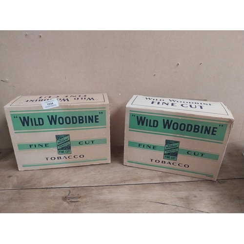 1334 - Two Wild Woodbine Fine Cut Tobacco cigarette cartons. {18 cm H x 25 cm W x 11 cm D}.