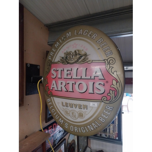 1340 - Stella Artois Lager double sided light up advertising sign. {74 cm H x 56 cm W}.