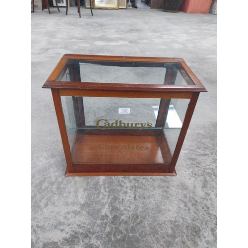 1342 - Cadbury's Chocolate mahogany and glass counter display cabinet. {42 cm H x 48 cm W x 27 cm D}.