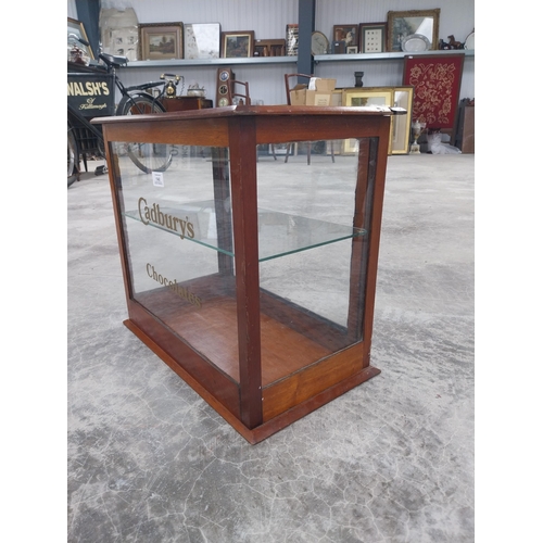 1342 - Cadbury's Chocolate mahogany and glass counter display cabinet. {42 cm H x 48 cm W x 27 cm D}.