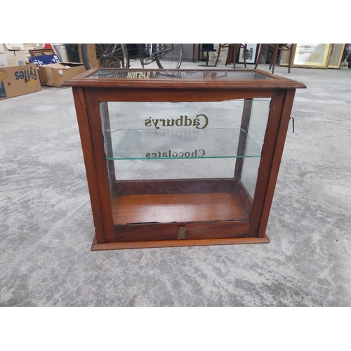 1342 - Cadbury's Chocolate mahogany and glass counter display cabinet. {42 cm H x 48 cm W x 27 cm D}.