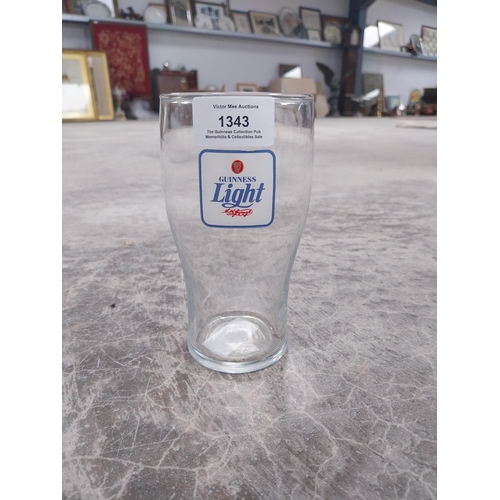 1343 - Guinness Light glass {15 cm H x 9 cm Dia}.